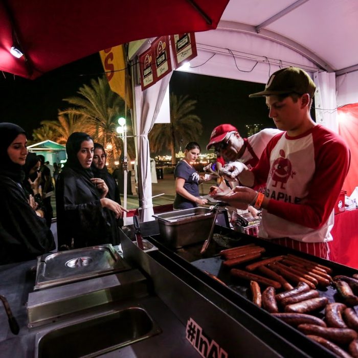 serving-big-apple-hot-dogs Serving Big Apple Hot Dogs