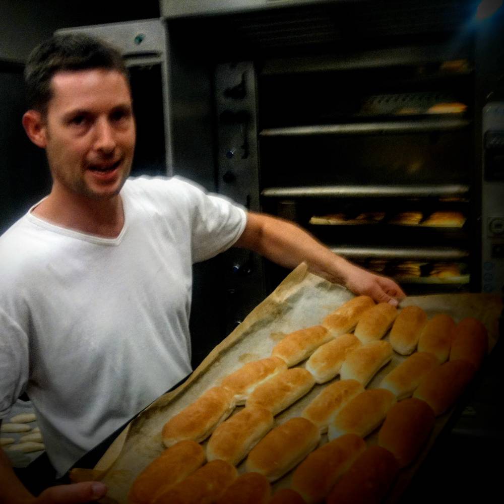 Freshly-baked-622-Hot-Dog-Buns-and-Baker-square