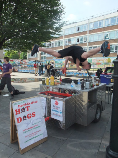 acrobatics at Big Apple Hot Dogs